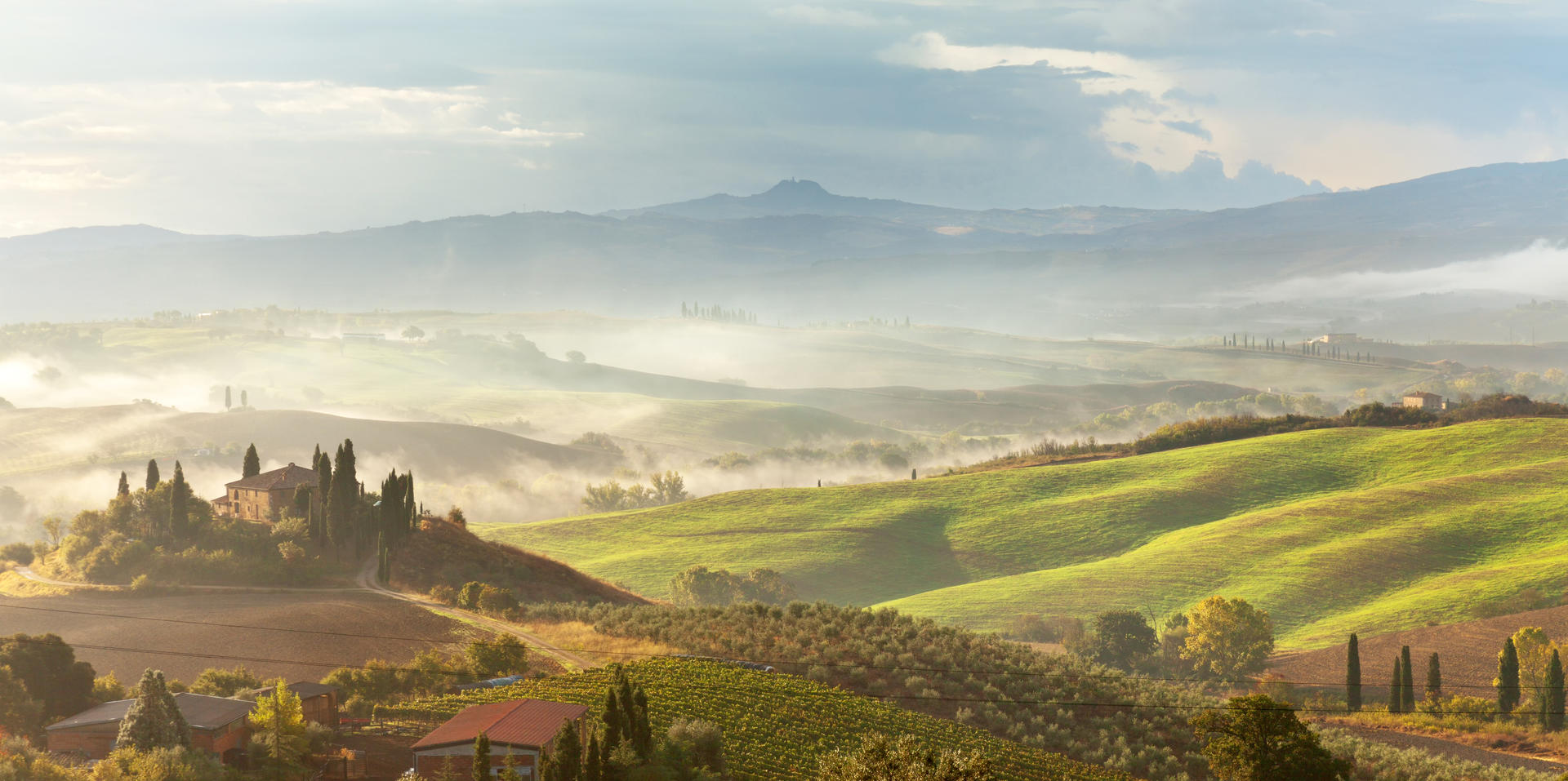 A beautiful Italian traditional rural landscape with autumn fiel